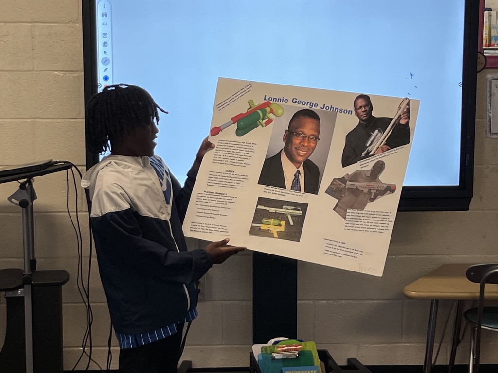 Student presenting poster
