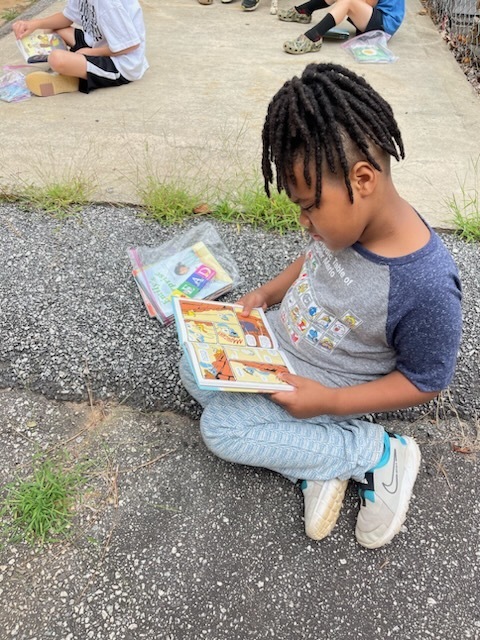reading on the blacktop